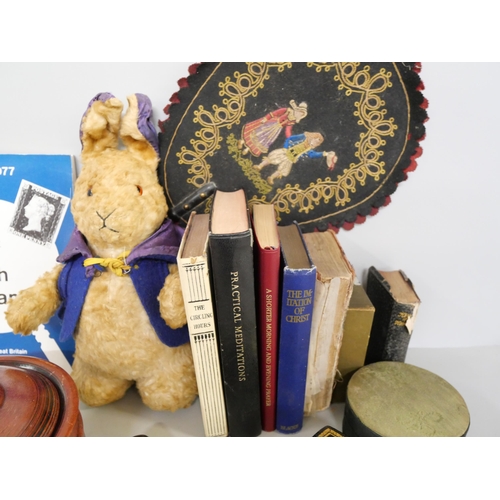 2137 - A mid 20th Century toy rabbit, books, two carved Black Forest letter openers, one in the form of a r... 