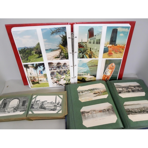 2141 - A collection of 20th Century Postcards and photographs within four albums. To include postcards from... 