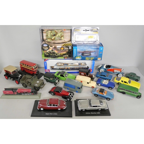 2147 - A collection of Die-Cast and plastic model vehicles, some boxed.