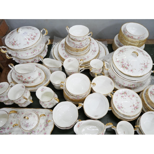 2159 - A large bone china Paragon dinner/tea service in the Victoriana Rose pattern with Royal Albert examp... 