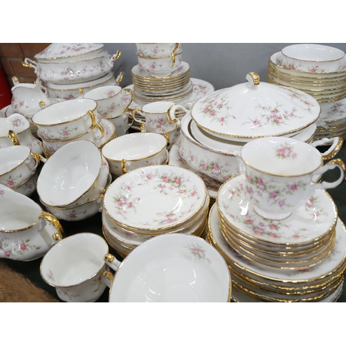 2159 - A large bone china Paragon dinner/tea service in the Victoriana Rose pattern with Royal Albert examp... 