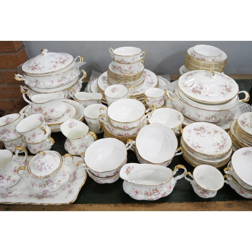 2159 - A large bone china Paragon dinner/tea service in the Victoriana Rose pattern with Royal Albert examp... 