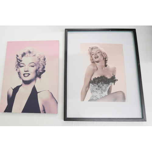 2160 - A collection of Marilyn Monroe pictures, framed and canvas examples. Together with a carry case **PL... 