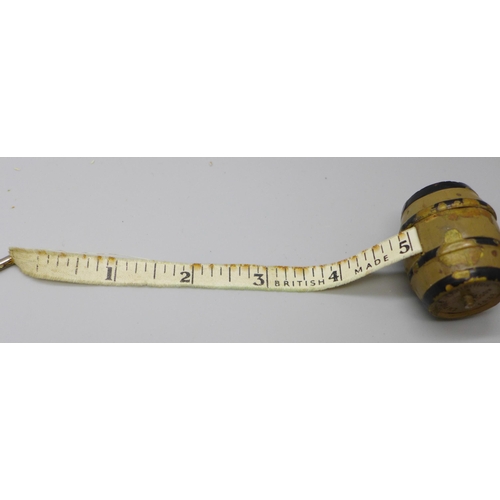 2191 - Breweriana; a novelty 1938 Glasgow Empire Exhibition Wm. Younger beer barrel tape measure, lacking s... 