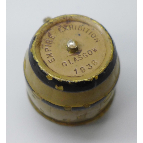 2191 - Breweriana; a novelty 1938 Glasgow Empire Exhibition Wm. Younger beer barrel tape measure, lacking s... 