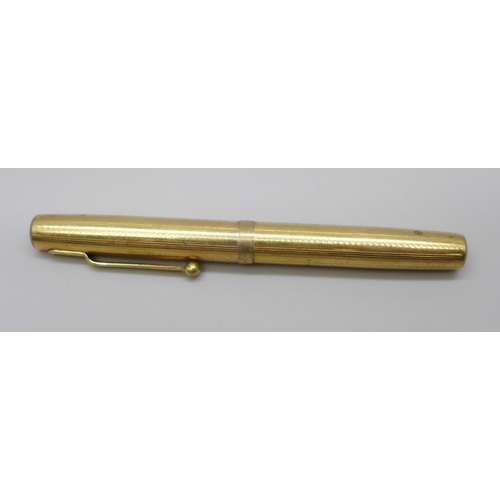 2191A - A novelty gold plated pen knife in the form of a fountain pen, 98mm *This lot is not available for p... 