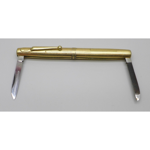 2191A - A novelty gold plated pen knife in the form of a fountain pen, 98mm *This lot is not available for p... 