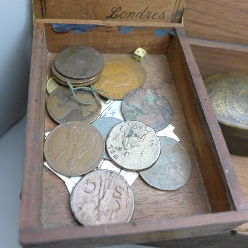 2202 - Two magnifying glasses, two eye glasses, two brass shells, a Chinese faux tortoiseshell box, coins a... 