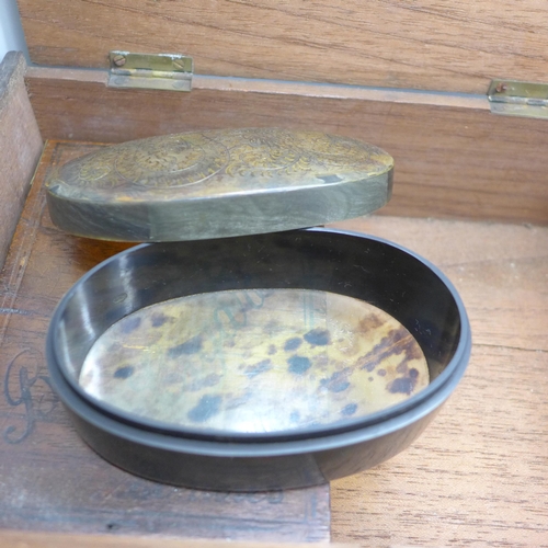 2202 - Two magnifying glasses, two eye glasses, two brass shells, a Chinese faux tortoiseshell box, coins a... 