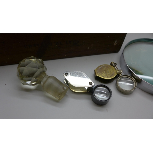 2202 - Two magnifying glasses, two eye glasses, two brass shells, a Chinese faux tortoiseshell box, coins a... 