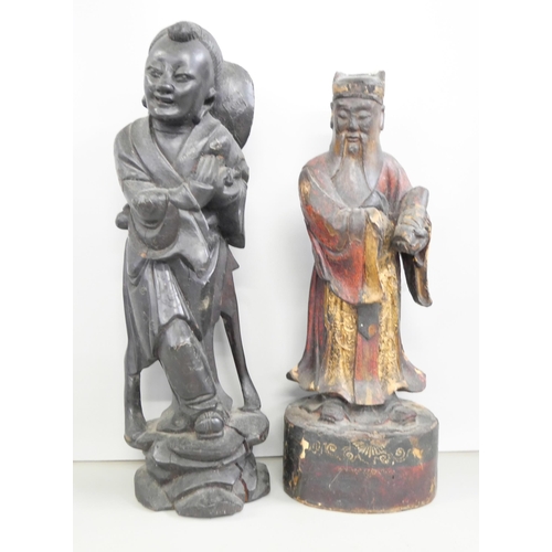 2206 - A collection of Chinese carved wooden figures including a gilt and red lacquered figure all A/F