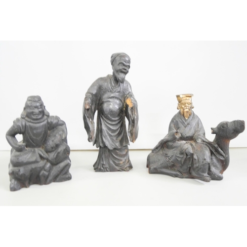 2206 - A collection of Chinese carved wooden figures including a gilt and red lacquered figure all A/F