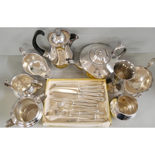 2218 - A collection of silver plated items to include a three piece Elkington coffee service designed by Er... 