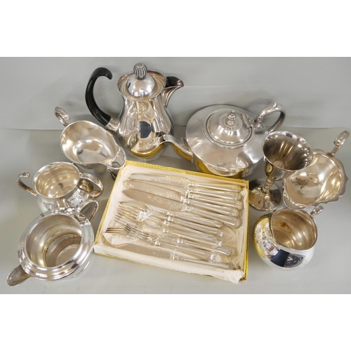 2218 - A collection of silver plated items to include a three piece Elkington coffee service designed by Er... 