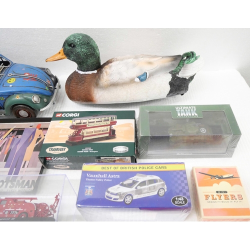 2224 - A box of vintage model vehicles including tin plate VW Beetle, Corgi Double Deck closed tram, and ot... 