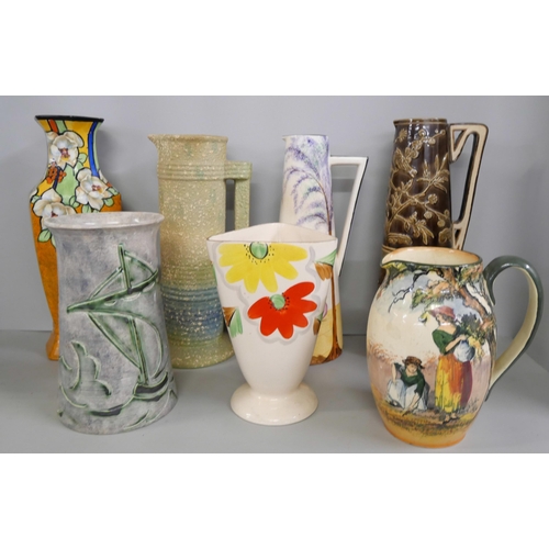 2233 - A mixed collection of pottery to include Gibson & Son ewer jug with flora and fauna decoration, two ... 