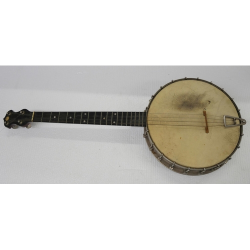 2243 - A four string banjo with case