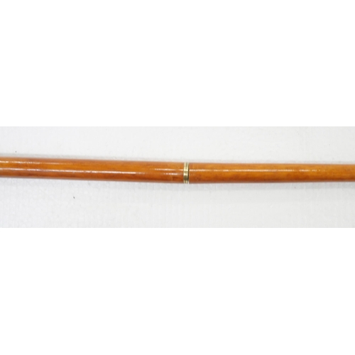 2244 - A wooden walking stick with brass eagle handle