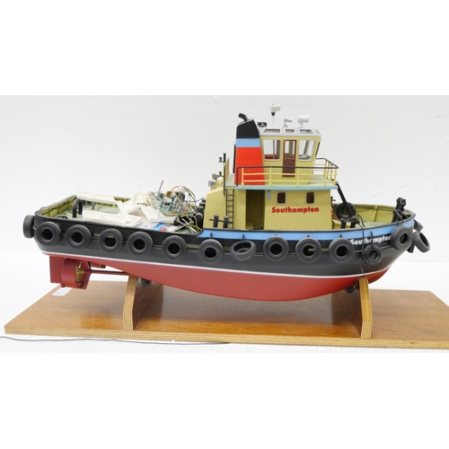 2258 - Four remote control model boats, one in packaging, two appear incomplete **PLEASE NOTE THIS LOT IS N... 