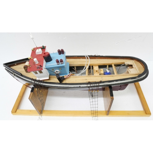 2258 - Four remote control model boats, one in packaging, two appear incomplete **PLEASE NOTE THIS LOT IS N... 