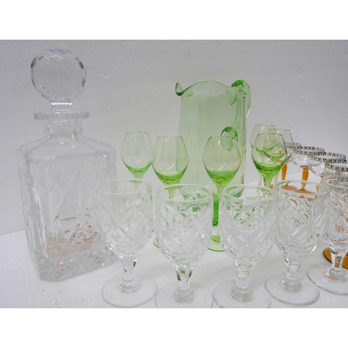 2261 - A collection of glass comprising of six green liquor glasses and pitcher, six crystal Sherry glasses... 