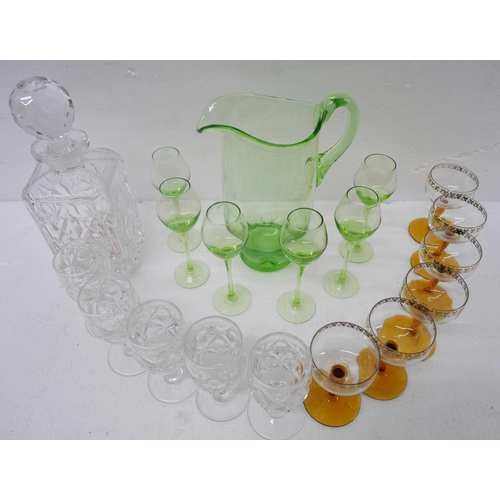 2261 - A collection of glass comprising of six green liquor glasses and pitcher, six crystal Sherry glasses... 