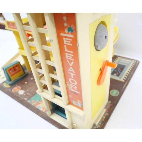 2265 - A vintage 20th Century Fisher Price parking ramp service center