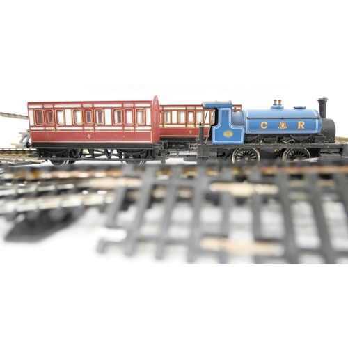 2276 - A box of Hornby train track for 00 gauge engines and a 00 gauge engine with two carriages **PLEASE N... 