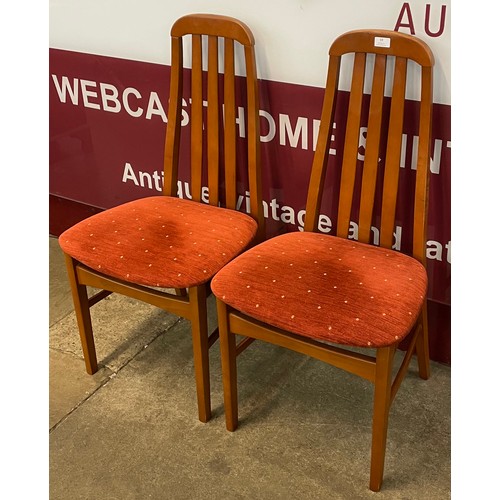 59 - A pair of Jentique teak dining chairs