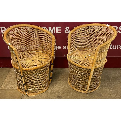 61 - A pair of Italian style wicker tub chairs