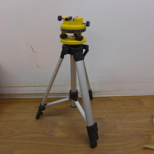 5054 - A cased Power Fix Laser Level Kit including laser, tripod stand and level