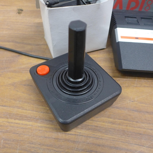 5067 - An Atari 2600 video computer system in original box with a 32in1 game cartridge, sold with power sup... 