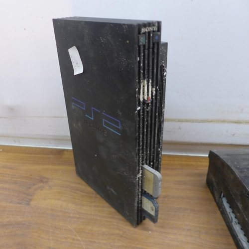 5084 - A Sony PlayStation 2 (model SCPH-30003k) and a Sony PlayStation 3 (model CECT103)