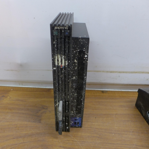 5084 - A Sony PlayStation 2 (model SCPH-30003k) and a Sony PlayStation 3 (model CECT103)