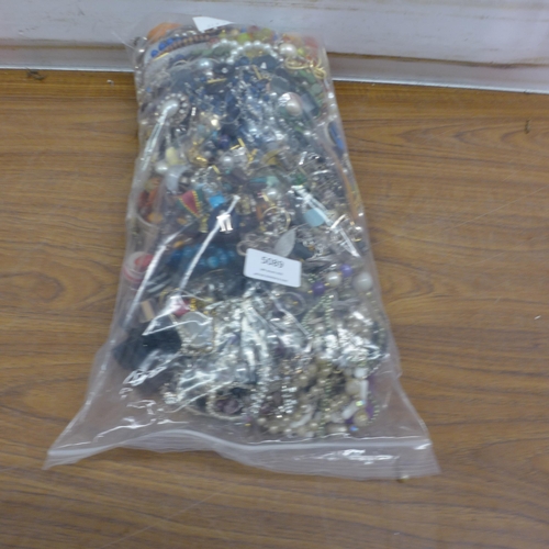 5089 - Two bags of assorted costume jewellery