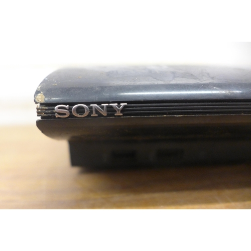 5105 - A Sony PlayStation 2 Mini (top loader) and Sony PlayStation 3 Slim (top loader) no cables or control... 