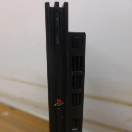 5105 - A Sony PlayStation 2 Mini (top loader) and Sony PlayStation 3 Slim (top loader) no cables or control... 