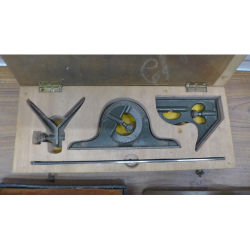 5106 - A watch makers clamp, a pair of engineers scales and a set square