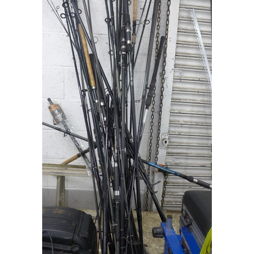 5190 - A large amount of assorted fishing rods and an Avanti fishing seat box