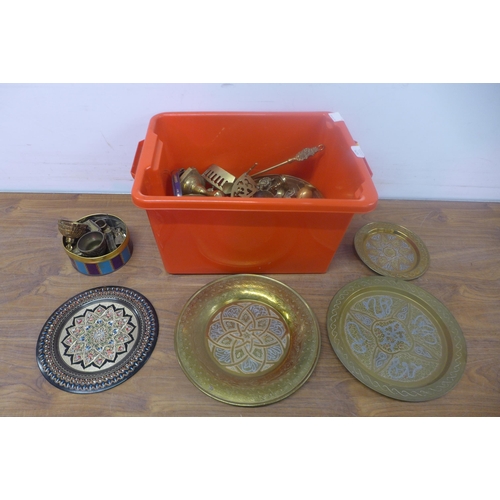 5279 - A large collection of metalware including brass plates, candlestick holders, bells and other items