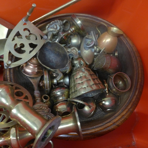 5279 - A large collection of metalware including brass plates, candlestick holders, bells and other items