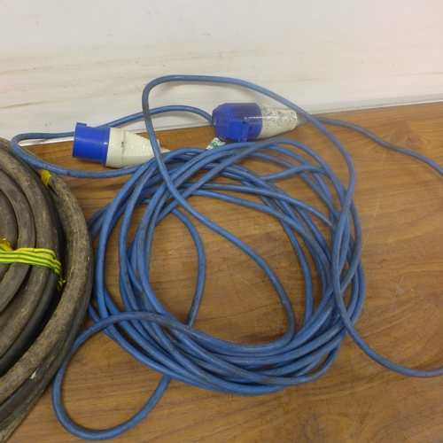 5289 - A length of armoured cable and a 240V blue plug caravan extension cable