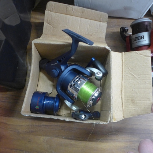 5298 - 9 assorted fishing reels including Matsuki, Avanti, etc., and a pair of caravan mirrors