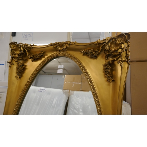 3123 - A large gilt effect carved framed mirror