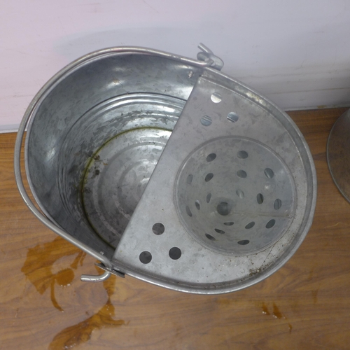 5255 - 2 galvanised mop buckets