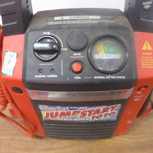 5257 - A Clarke jump start 1010 heavy duty jump start with built in compressor