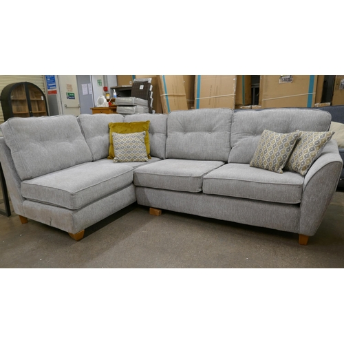 3181 - A grey fabric upholstered corner sofa and footstool