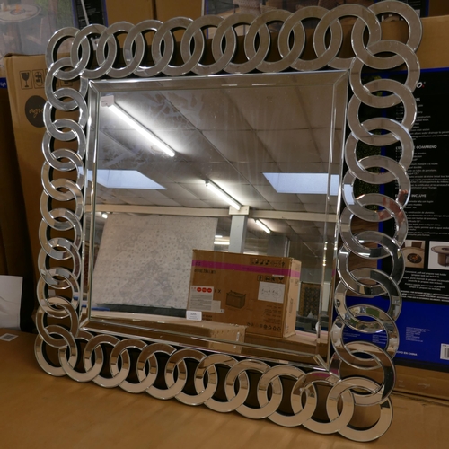 3203 - A large mirror with circle design frame