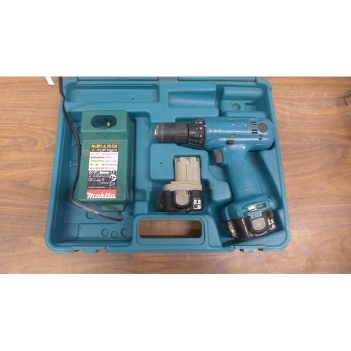 5008 - A quantity of power tools including a Makita 12V drill, a Black and Decker 240V planer and a Wickes ... 