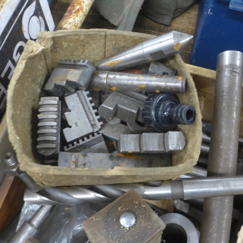 5036 - A box of assorted lathe parts including chucks, boars, extenders, drill bits, etc.